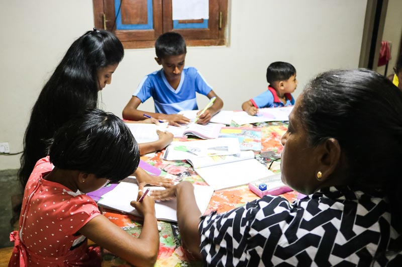 SOS family doing their homework in Sri Lanka