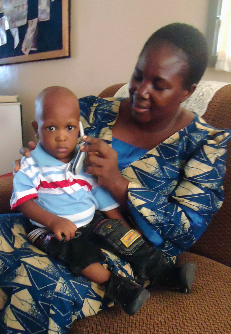 Jonathan with his SOS mother when he first arrived in 2011