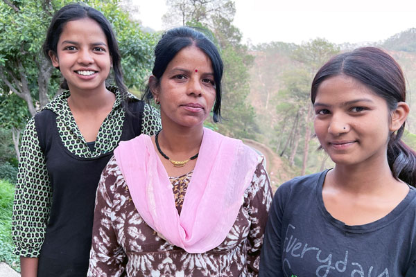 Manju and her daughters in Bhumiadar, India.