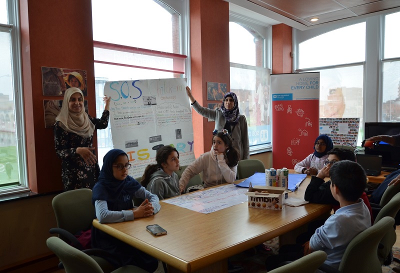 Abraar Elementary students and teachers at the SOS offices