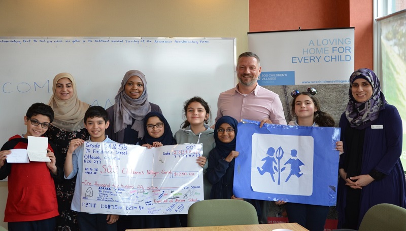 Abraar Elementary with SOS President Thomas Bauer