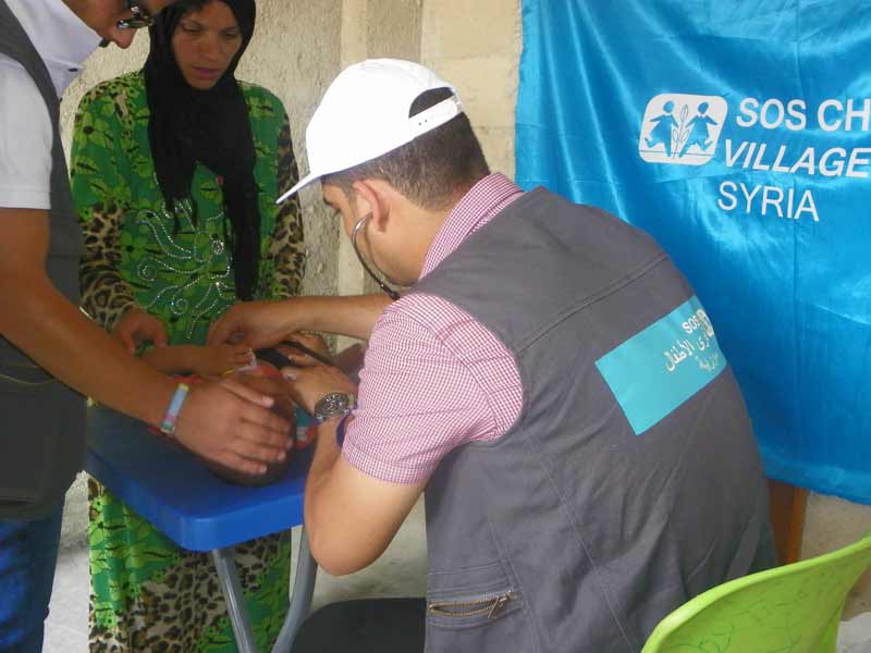 Providing medical care to children in Aleppo