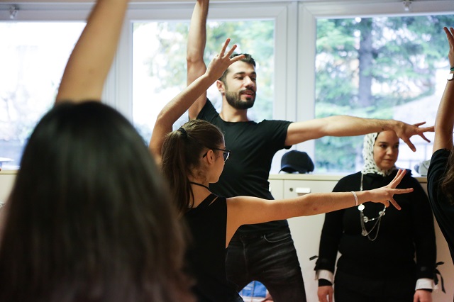 Ahmed teaching a dance class for SOS kids.