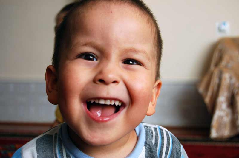 Boy laughin in the SOS Village in Uzbekistan