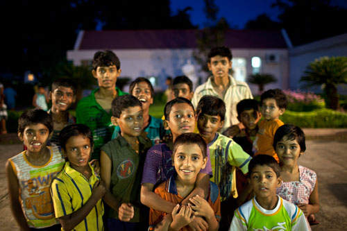 Boys posing for a picture after evening prayers in Kolkata, India