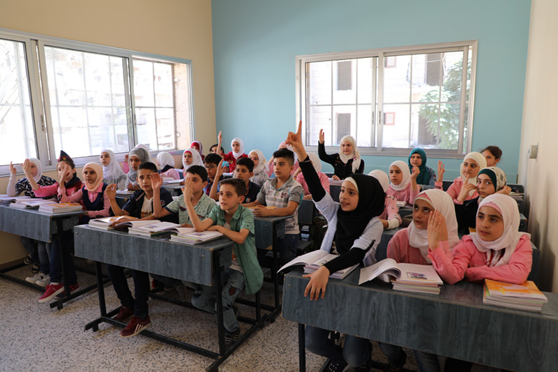 Children in new classroom in Aleppo Syria
