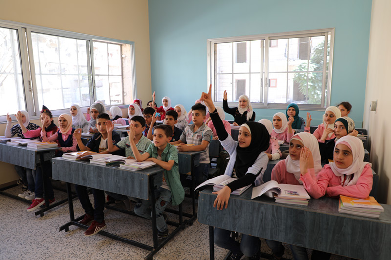 Children in new classroom in Aleppo Syria