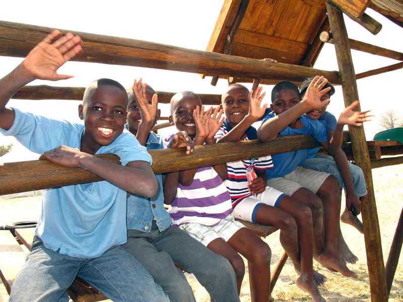 Children waiving in the SOS Children's Village in Ondangwa, Namibia