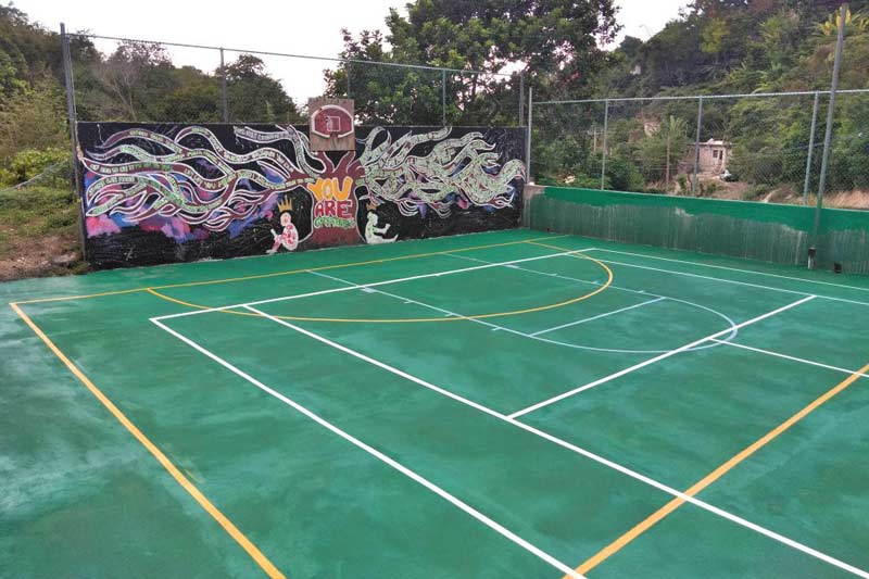 Repaired tennis and multi-purpose court