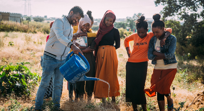 Young people planting trees