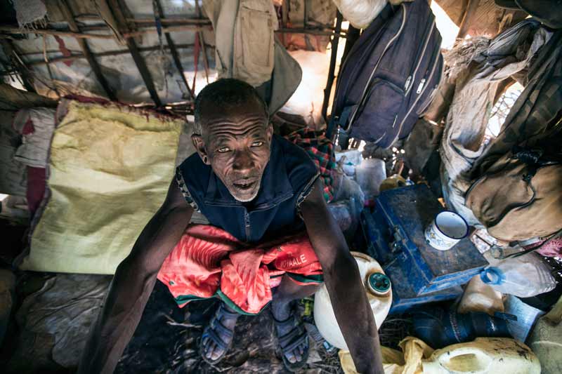 Holathura Eisimuobanai shares this tiny hut with his wife and six children in Rarima