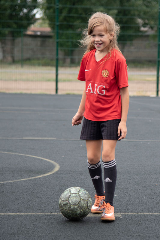 Girl playing soccer in Ukraine