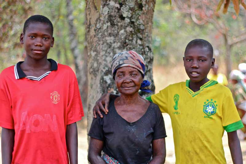 Grandmother with grandsons in Angola