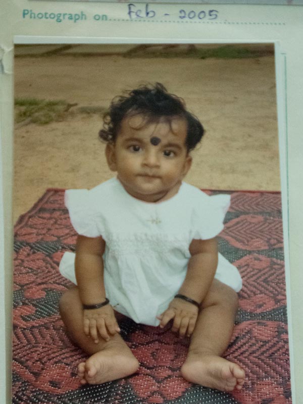 Janani sitting on carpet