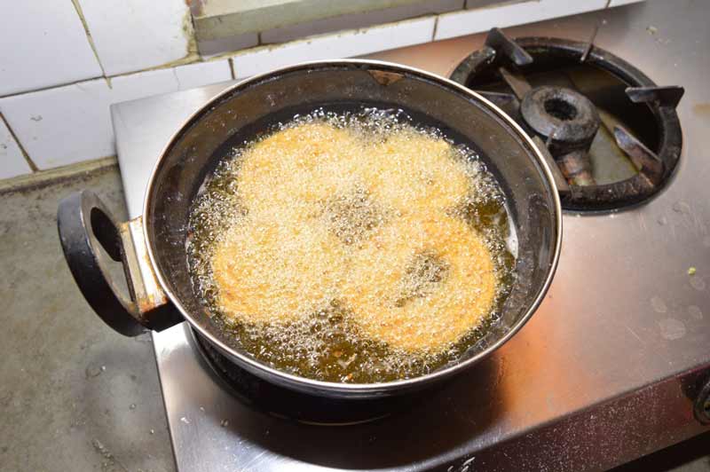 Deep frying Chakali
