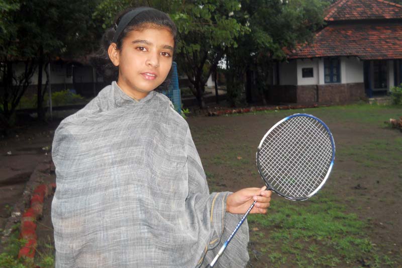 Girl with badminton racket