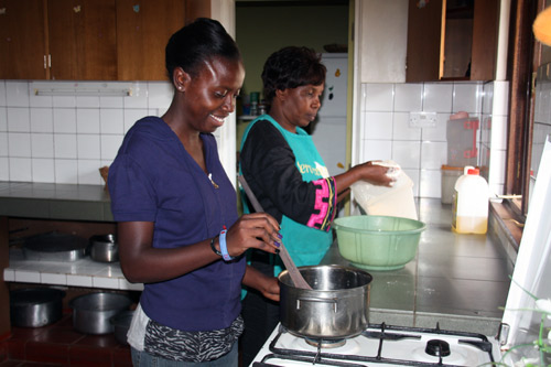 SOS mother and daughter making dinner in Tanzania