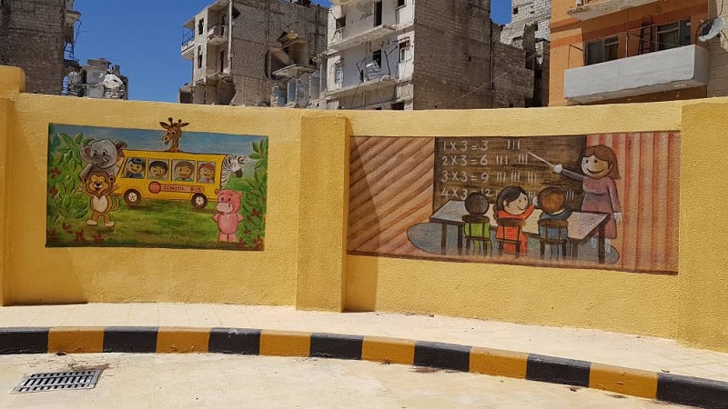 Painted mural on rebuilt school in Aleppo Syria