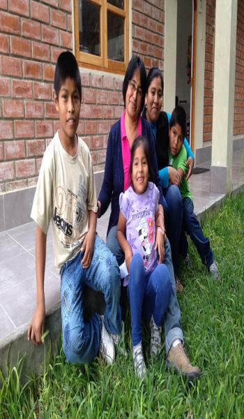 Daniel and his new SOS family in Pachacamac, Peru