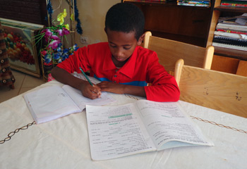 Samuel studing in his SOS home in Harrar, Ethiopia