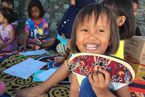 Smiling girl at SOS Child Friendly Space in Indonesia Smiling girl at SOS Child Friendly Space in Indonesia