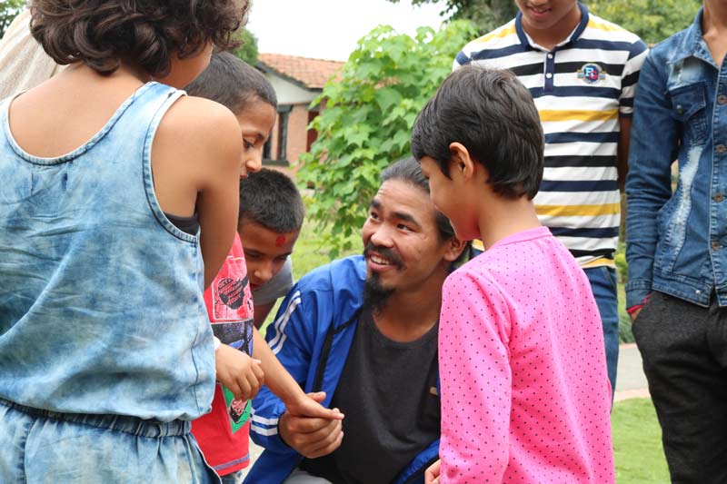 Alumni Rupesh with SOS children
