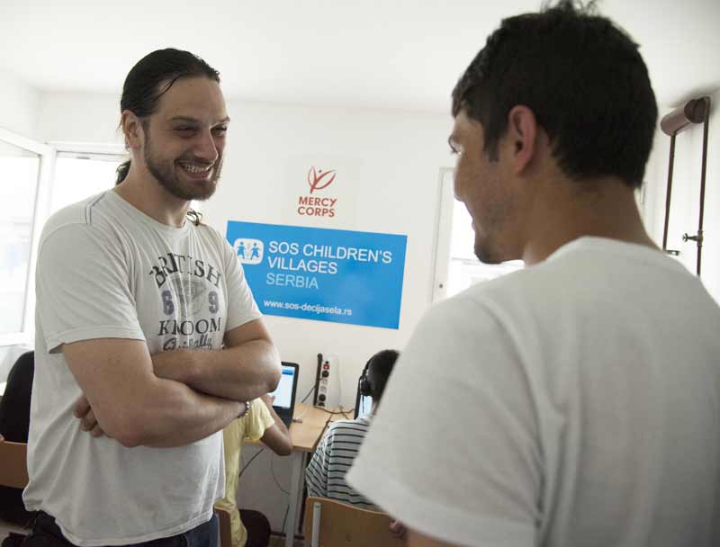 SOS worker helping refugee children in Belgrade, Serbia