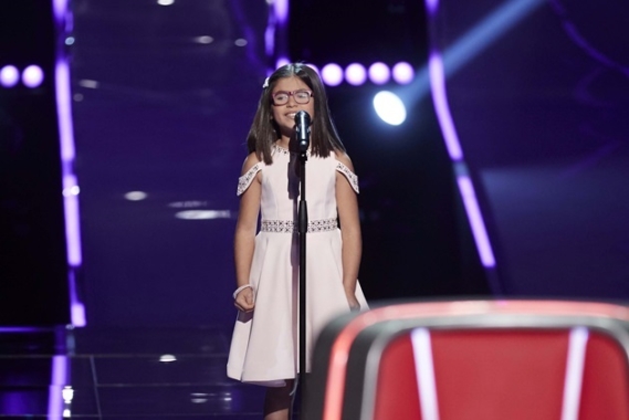 Nesrine prepares to perform on The Voice Kids.