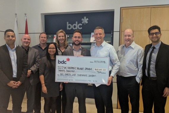 Cheque presentation from BDC to SOS  Children's Villages Canada