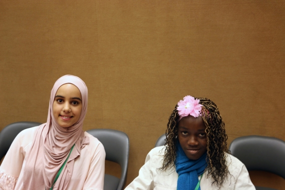 Haneen and Agnes prepare to speak in Geneva at UN