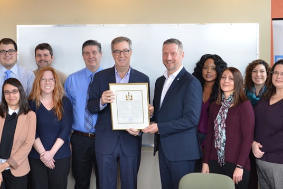 Ottawa Mayor Jim Watson presents 50th anniversary letter to SOS staff