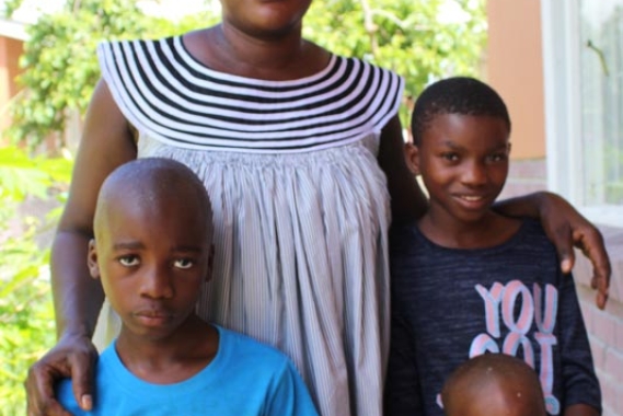 SOS mother Penny with Pius, Veila and Tulela
