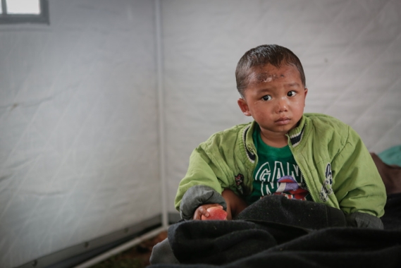 Boy in relief camp after Nepal earthquake