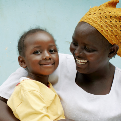 A woman holding a child