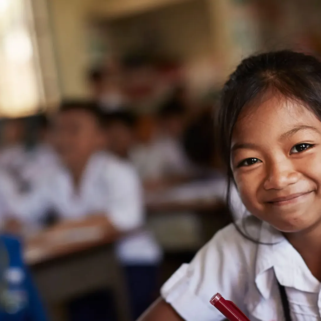 A girl sitting in a classroom
