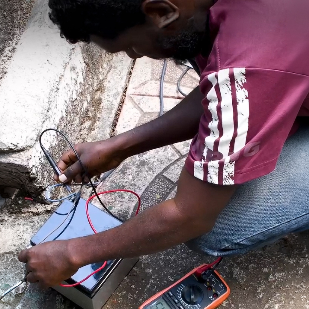 youth in Ethiopia training as a solar panel technician