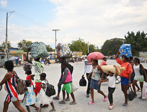 People flee gang violence in the Pétion-Ville neighbourhood of Port-au-Prince