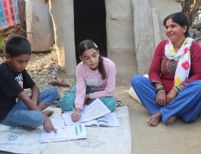 Tika and her two children in Nepal.