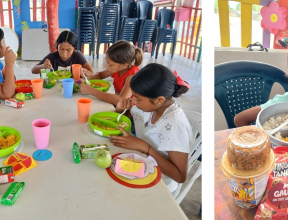 Children eating a nutritious snack at an SOS Children’s Villages child-friendly space in Colombia.  