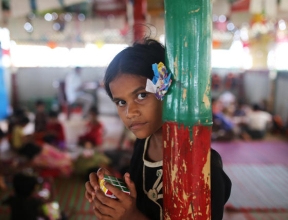 Rohingya refugee child looking directly at camera