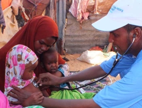 Children being checked for malnutrition