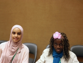 Haneen and Agnes prepare to speak in Geneva at UN