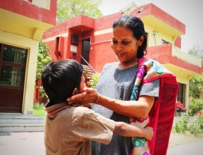 SOS mother and son embracing