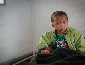 Boy in relief camp after Nepal earthquake