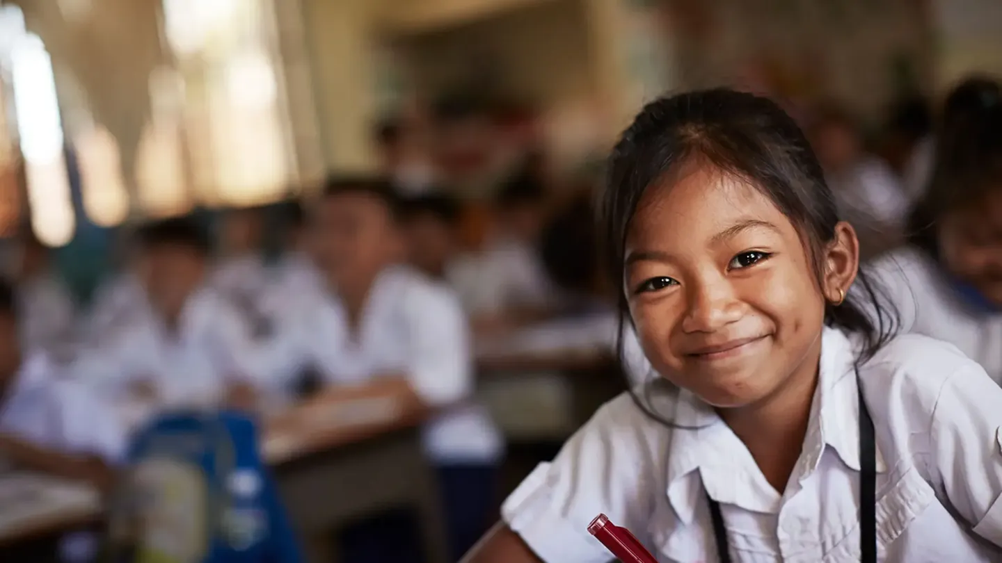 A girl sitting in a classroom