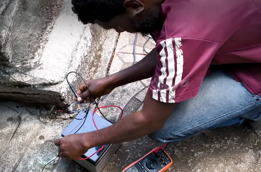 youth in Ethiopia training as a solar panel technician