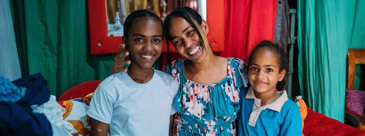 Jocaylin with her two daughters in the DR