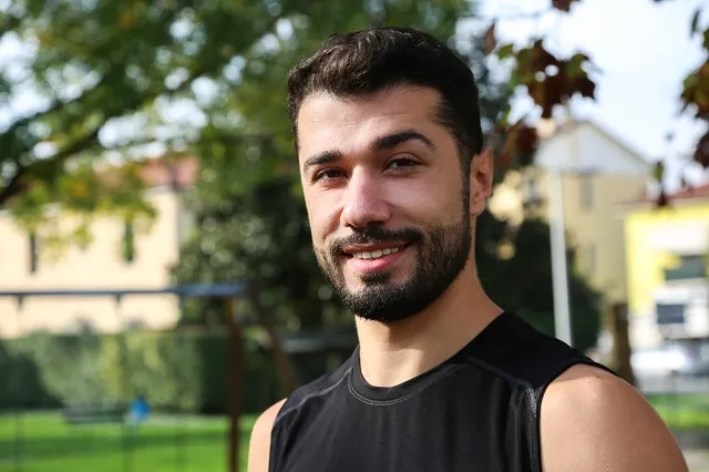 Ahmed Joudeh smiling for the camera.