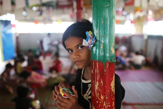 Rohingya refugee child looking directly at camera