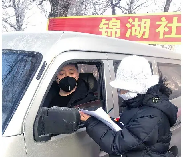 A visitor is screened for coronavirus at an SOS Children's Village.